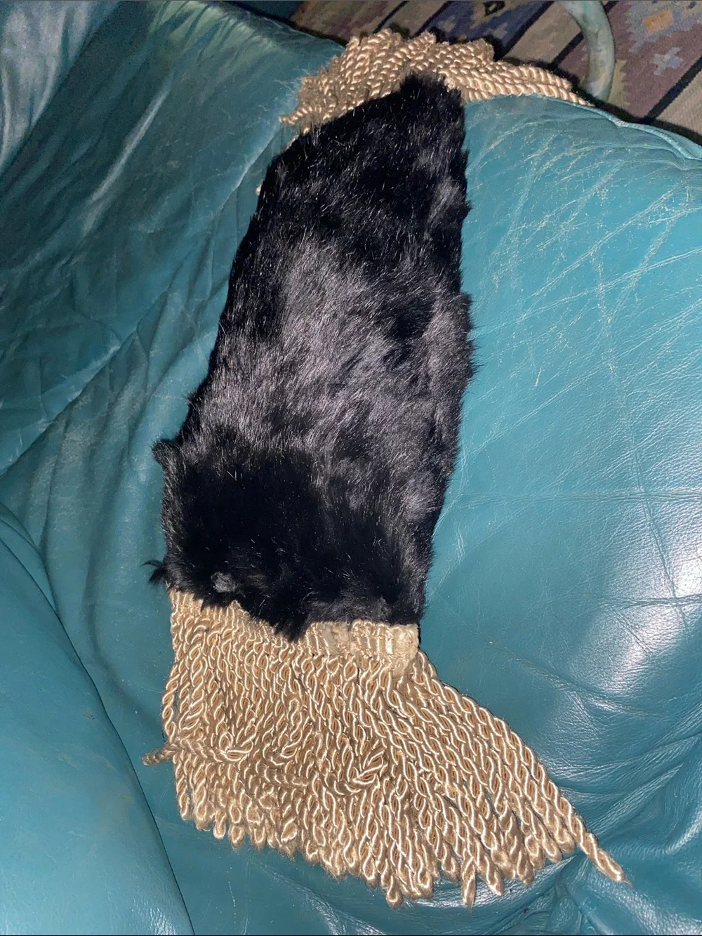 Luxurious Black Fur Throw Pillow with Gold Fringe